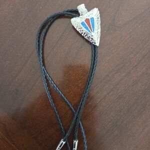 Silver Arrowhead Bolo Tie with Red and Blue Inlay